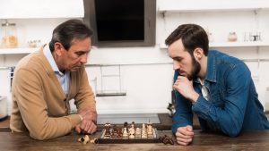 image of 2 players playing chess like a chess grandmaster